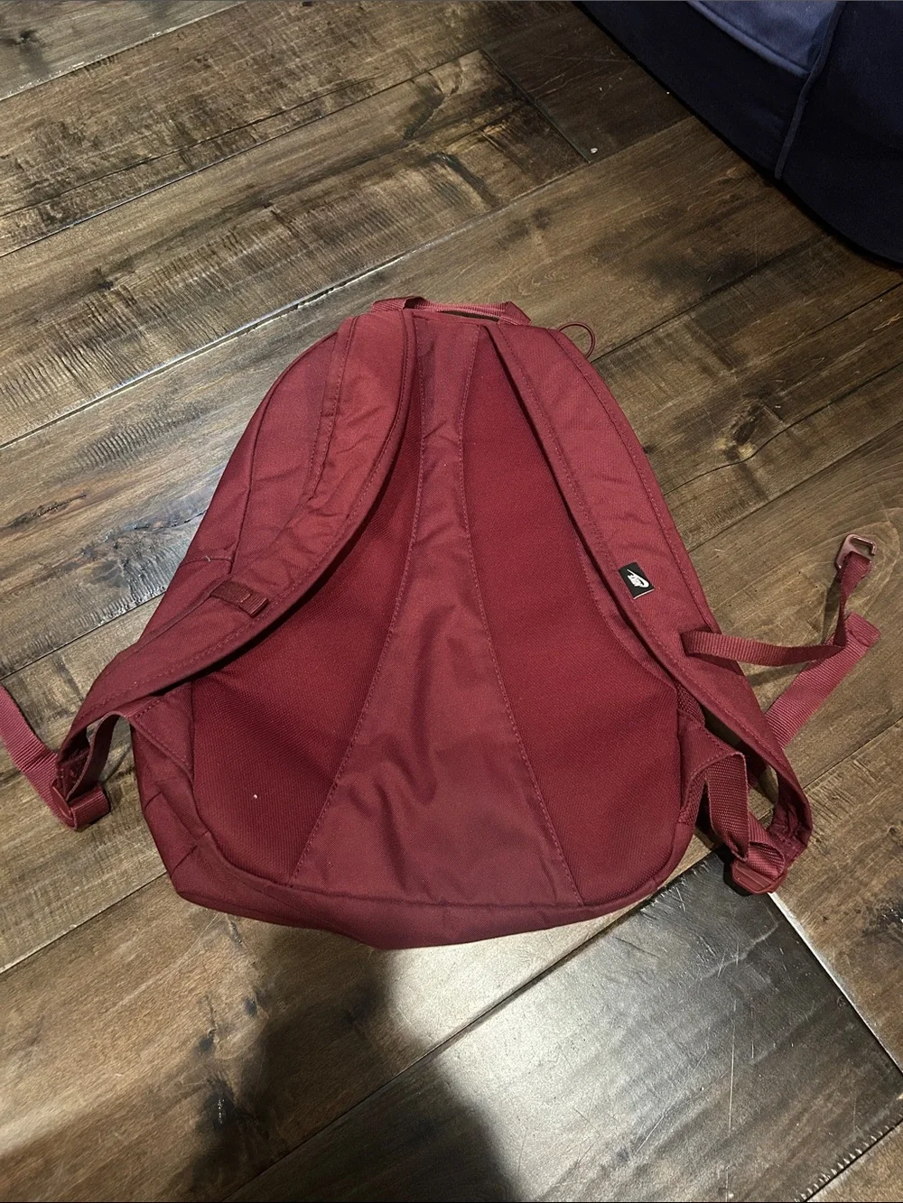 Nike Maroon Backpack with White Swoosh and Front Bungee